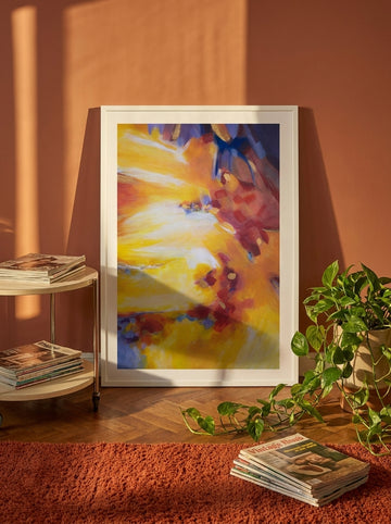 Modern wall art print leaning against the wall in a retro 70s living room
