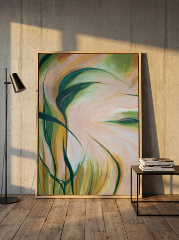 Oversized statement canvas wall art with a natural timber surround leaning against the wall in an industrial loft dining room