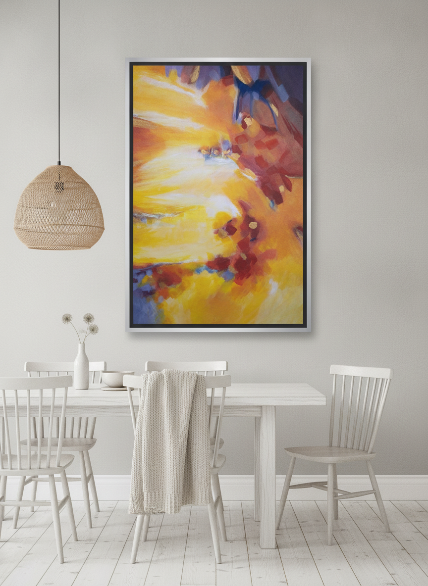 Canvas wall art with a silver leaf surround styled on the wall in a bright Scandinavian dining room