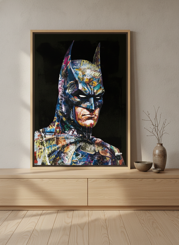 Canvas wall art with a natural timber surround standing on a sideboard in a warm Japandi home office