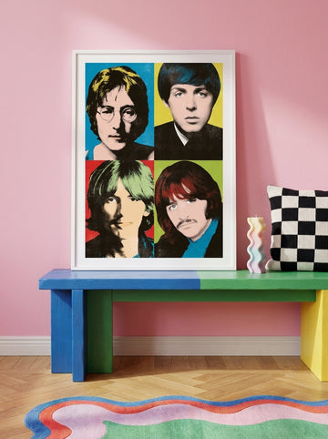 Modern wall art print standing on a side table in a colourful eclectic bedroom