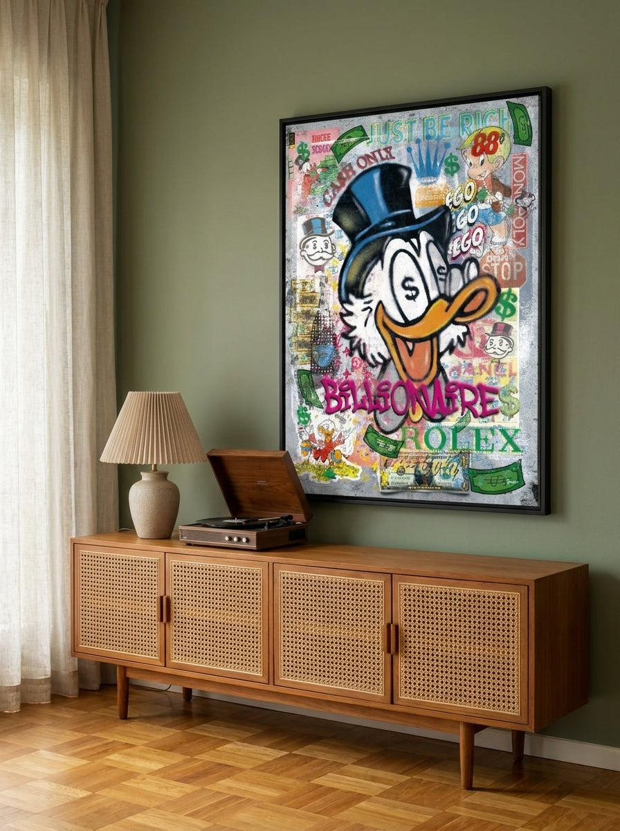 Canvas wall art with a black surround styled on the wall in a mid-century living room