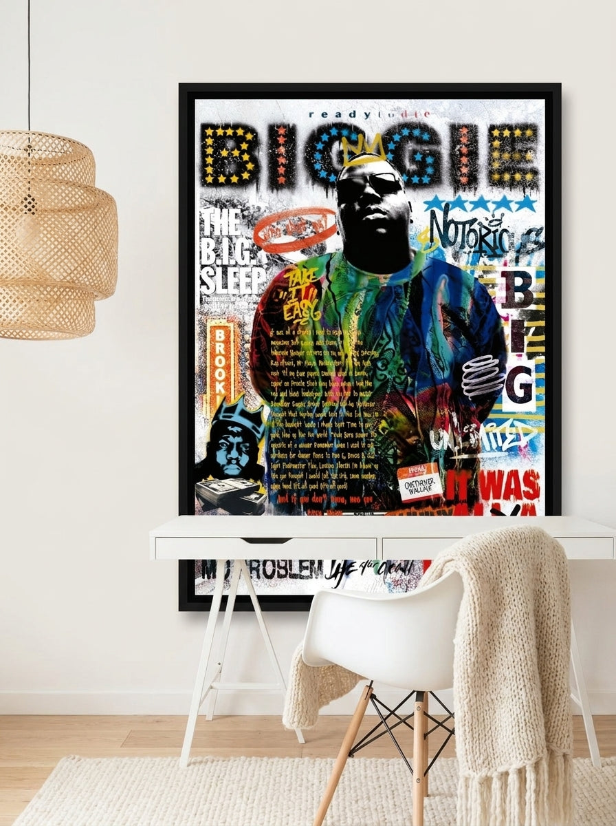 Canvas wall art with a black surround styled on the wall in a bright Scandinavian home office