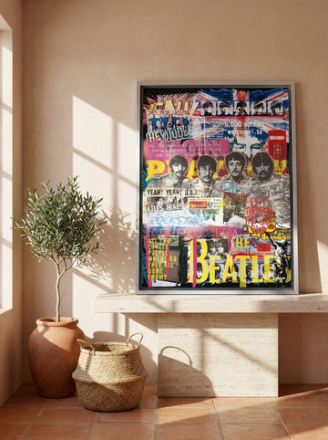 Canvas wall art with a silver leaf surround standing on a console in a Mediterranean bedroom