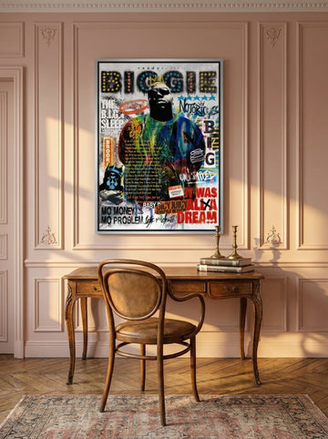 Canvas wall art with a silver leaf surround styled on the wall in a Parisian home office