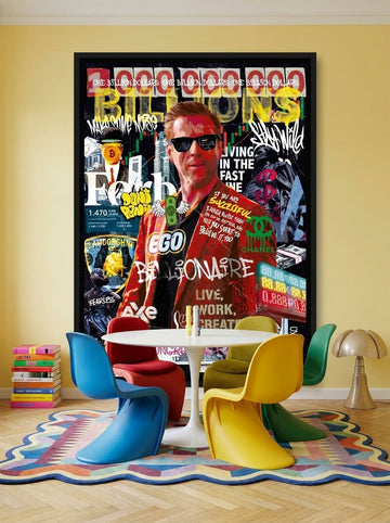 Canvas wall art with a black surround styled on the wall in a colourful eclectic dining room
