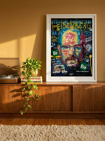 Modern wall art print standing on a sideboard in a retro 70s home office