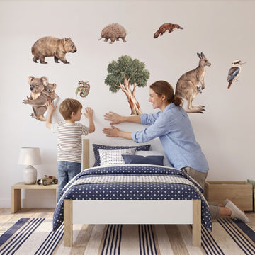Aussie Bush Babies Wall Decal Set Wall Sticker Decals wall decals: a boy and his mum putting the decals up in a boy's bedroom
