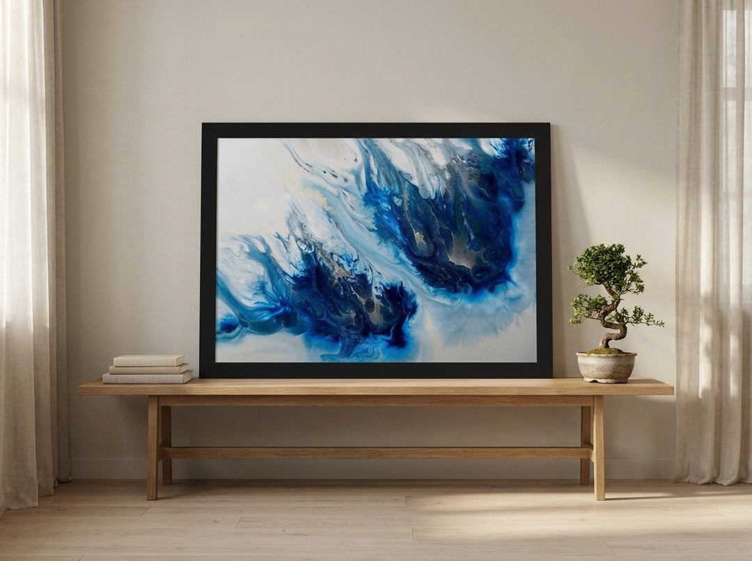 Modern wall art print standing on a bench in a warm Japandi dining room