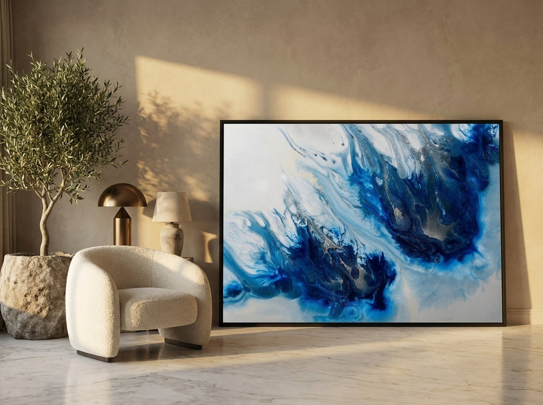 Oversized statement modern wall art print leaning against the wall in a luxe home office
