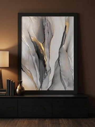 Modern wall art print standing on a console in a moody home office