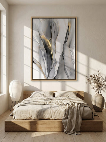 Canvas wall art with a natural timber surround styled on the wall in a warm Japandi bedroom