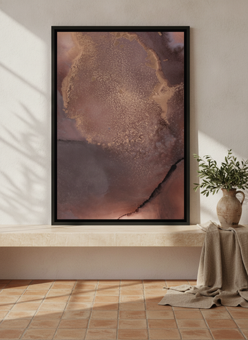 Canvas wall art with a black surround standing on a console in a Mediterranean living room