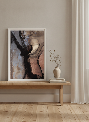Modern wall art print standing on a bench in a warm Japandi home office