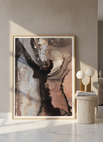 Oversized statement modern wall art print leaning against the wall in a luxe living room