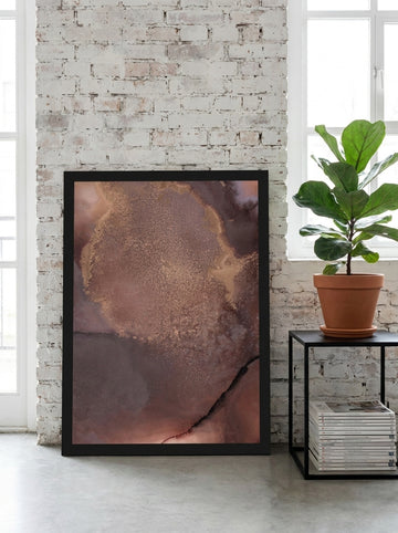 Modern wall art print leaning against the wall in an industrial loft living room