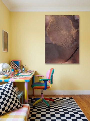 Stretched canvas wall art styled on the wall in a colourful eclectic home office