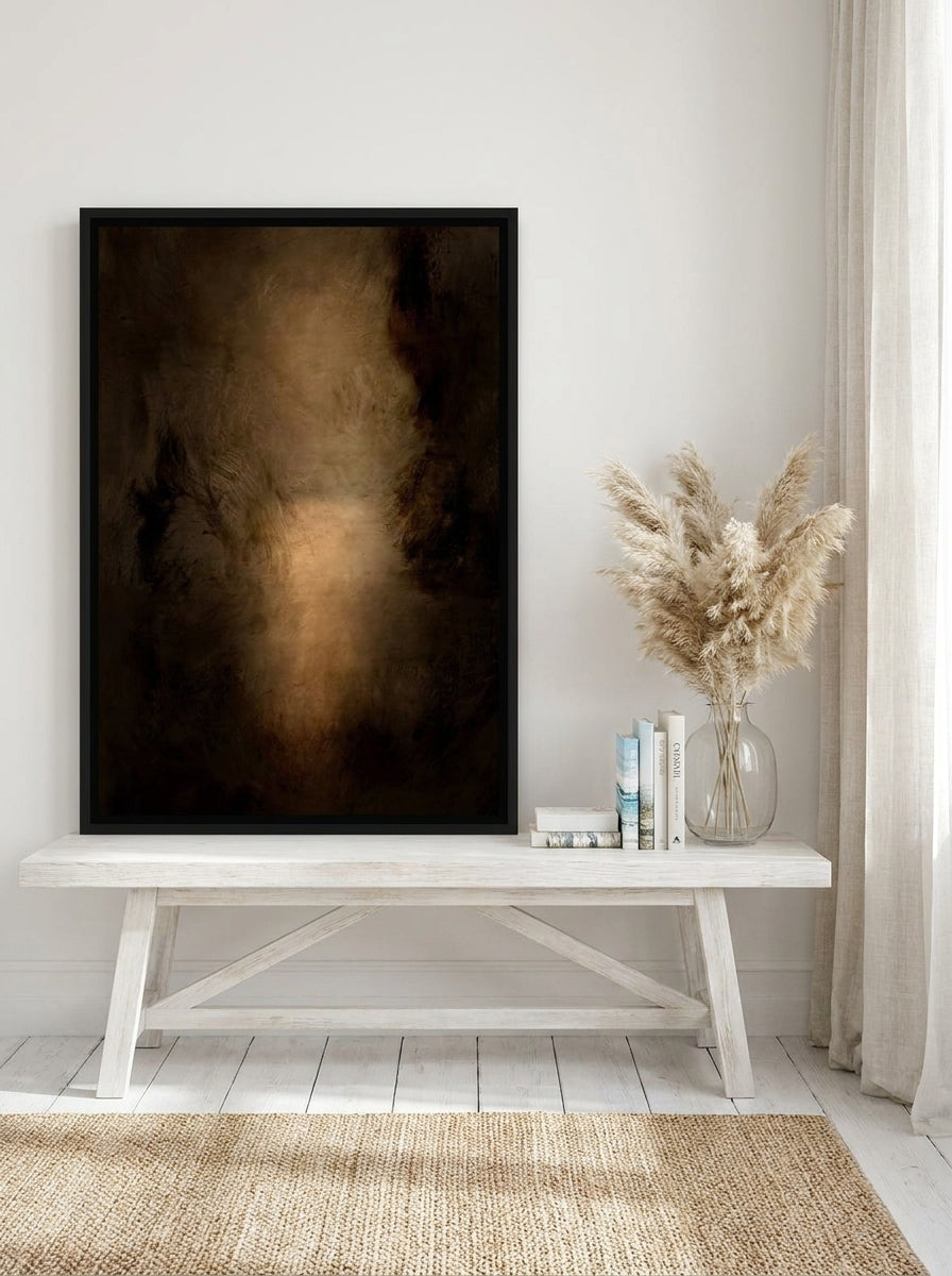Canvas wall art with a black surround standing on a console in a coastal living room