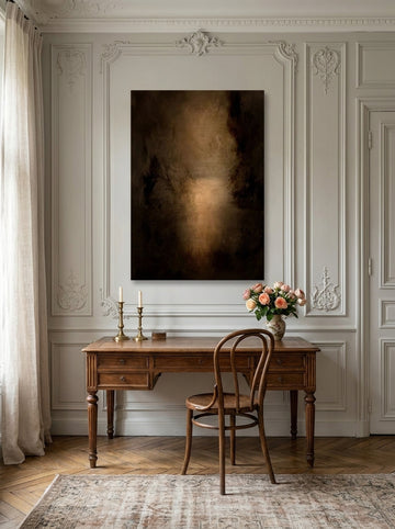 Stretched canvas wall art styled on the wall in a Parisian home office