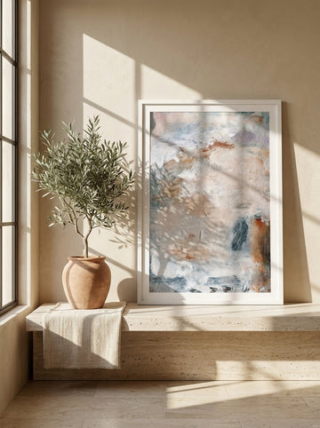 Modern wall art print standing on a console in a Mediterranean home office