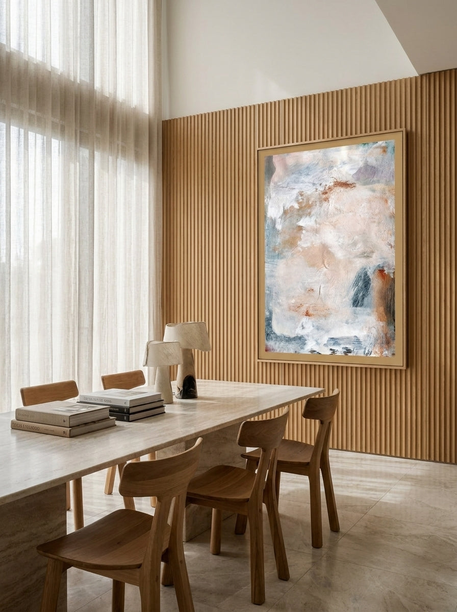 Oversized statement modern wall art print styled on the wall in a luxe dining room