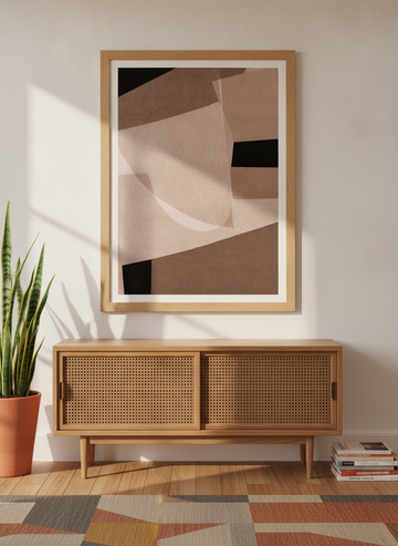Modern wall art print styled on the wall in a mid-century living room