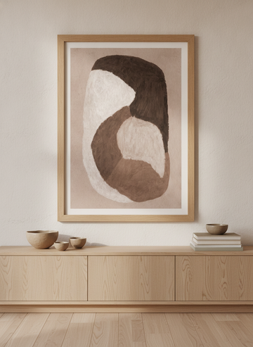 Modern wall art print styled on the wall in a warm Japandi living room