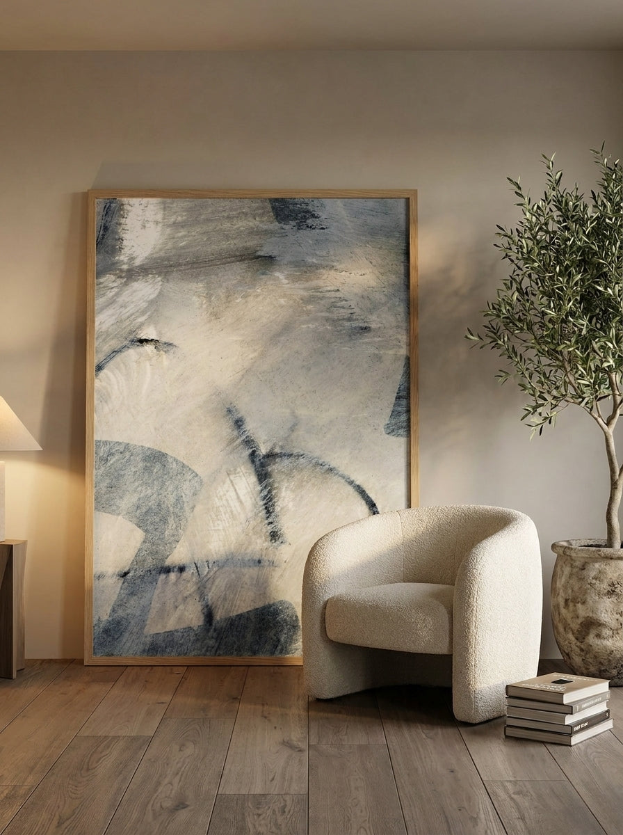 Oversized statement modern wall art print leaning against the wall in a luxe bedroom