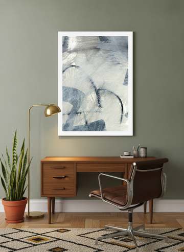 Modern wall art print styled on the wall in a mid-century home office