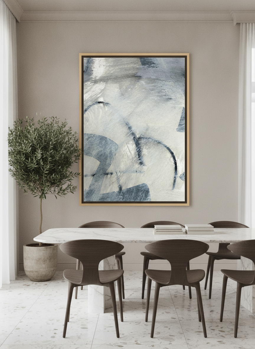 Oversized statement canvas wall art with a natural timber surround styled on the wall in a luxe dining room