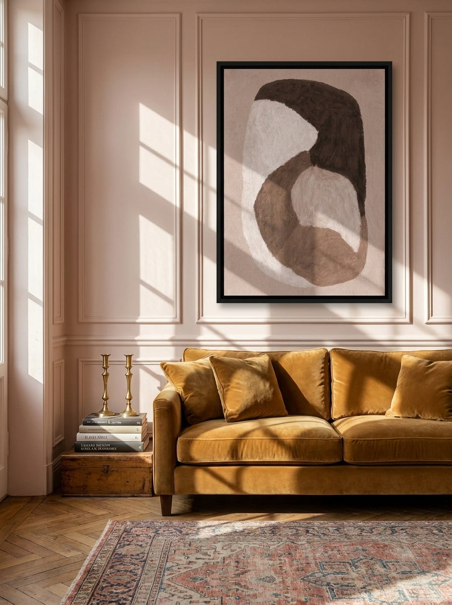 Canvas wall art with a black surround styled on the wall in a Parisian living room