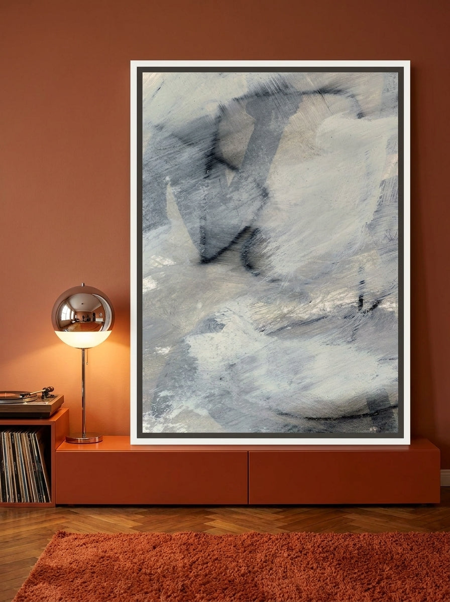 Canvas wall art with a white surround standing on a sideboard in a retro 70s bedroom