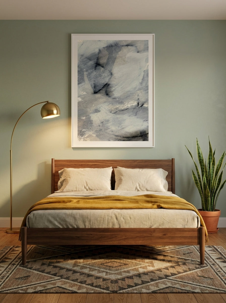 Modern wall art print styled on the wall in a mid-century bedroom