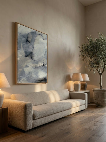 Oversized statement modern wall art print styled on the wall in a luxe living room