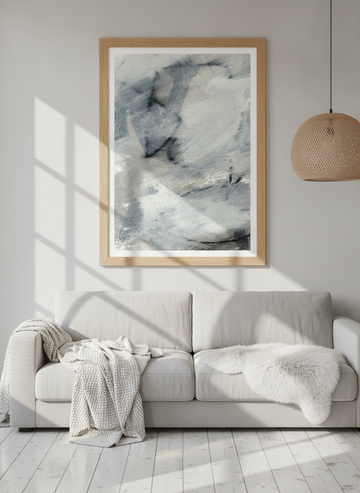 Modern wall art print styled on the wall in a bright Scandinavian living room