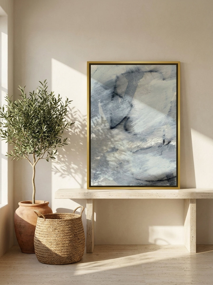 Canvas wall art with a gold leaf surround standing on a console in a Mediterranean home office