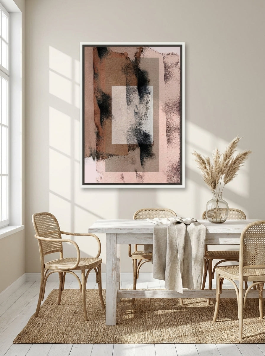 Canvas wall art with a white surround styled on the wall in a coastal dining room