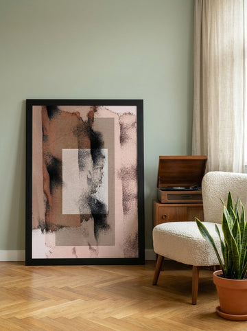 Modern wall art print leaning against the wall in a mid-century dining room