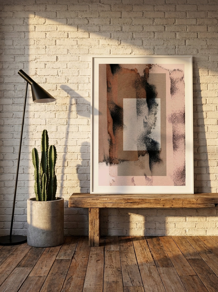 Modern wall art print standing on a bench in an industrial loft bedroom