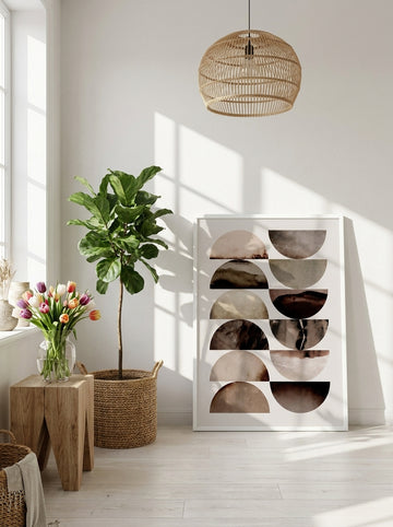 Modern wall art print leaning against the wall in a bright Scandinavian home office