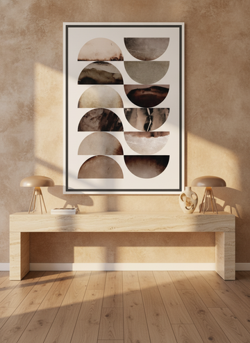 Oversized statement canvas wall art with a white surround styled on the wall in a luxe living room