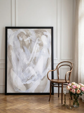 Oversized statement modern wall art print leaning against the wall in a Parisian living room