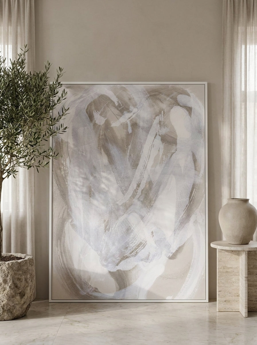 Oversized statement modern wall art print leaning against the wall in a luxe living room