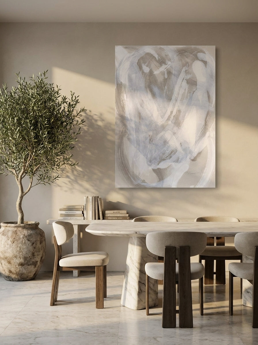 Stretched canvas wall art styled on the wall in a luxe dining room