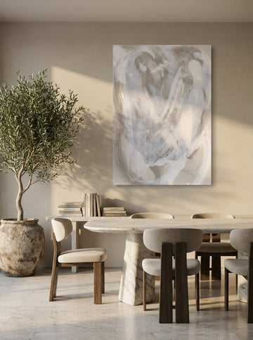 Stretched canvas wall art styled on the wall in a luxe dining room