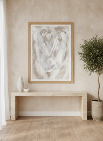 Modern wall art print styled on the wall in a luxe living room