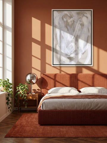 Canvas wall art with a white surround styled on the wall in a retro 70s bedroom