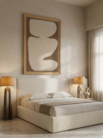 Oversized statement modern wall art print styled on the wall in a luxe bedroom