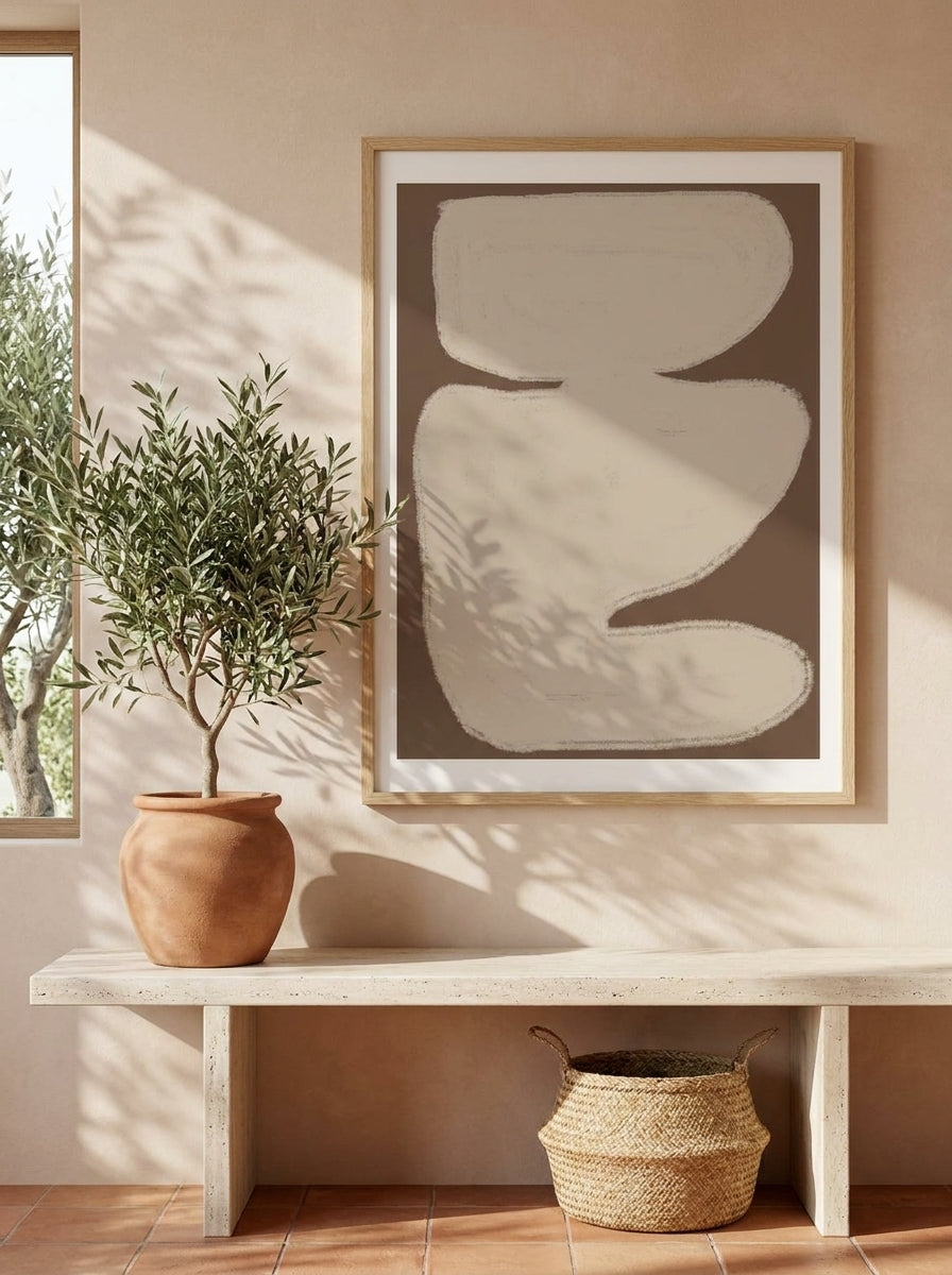 Modern wall art print styled on the wall in a Mediterranean living room