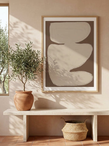 Modern wall art print styled on the wall in a Mediterranean living room